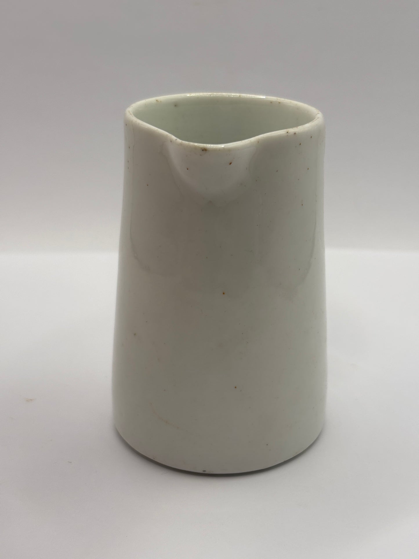 Old small white jug. 8cms