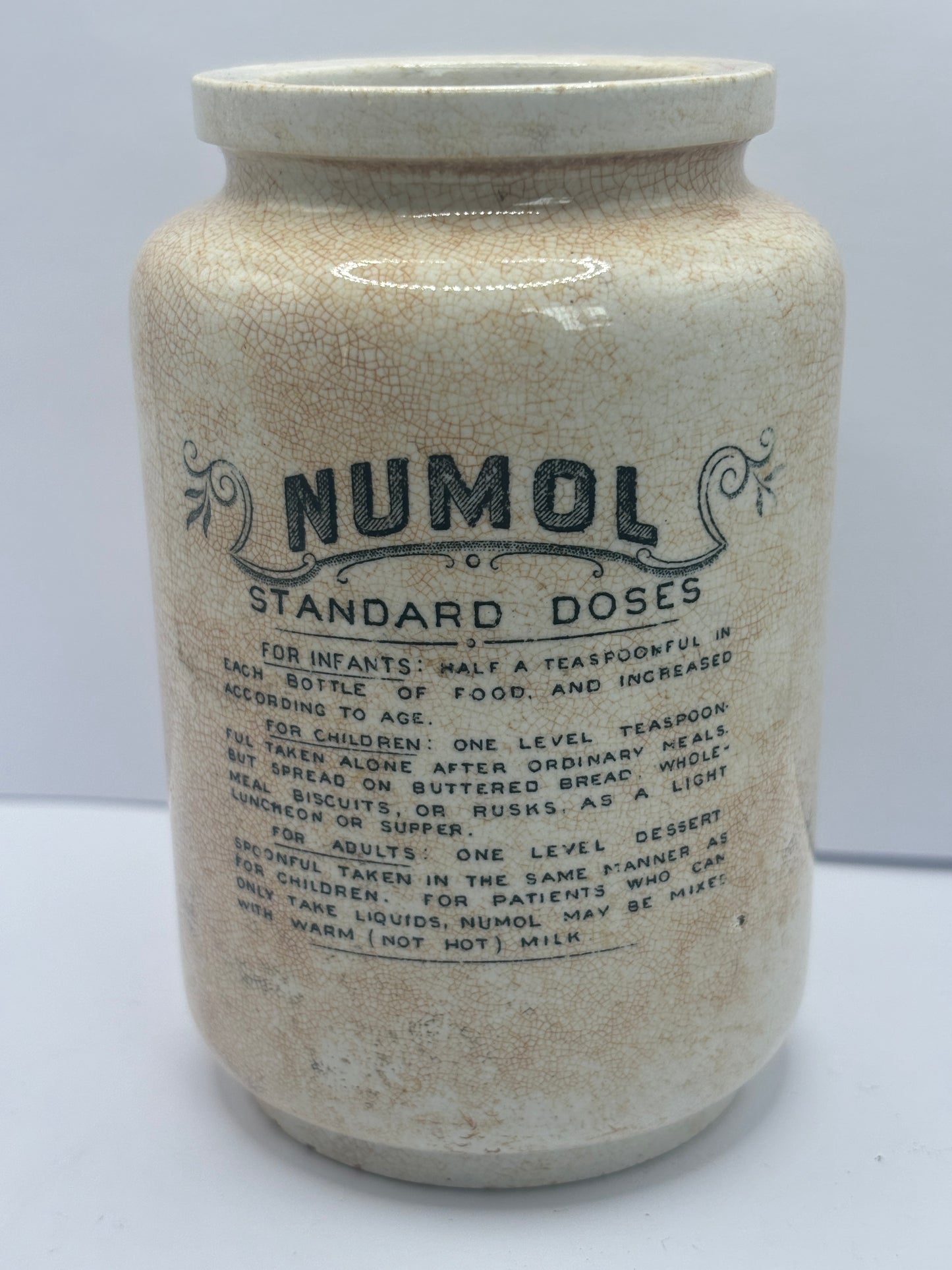 Early numol advertising jar