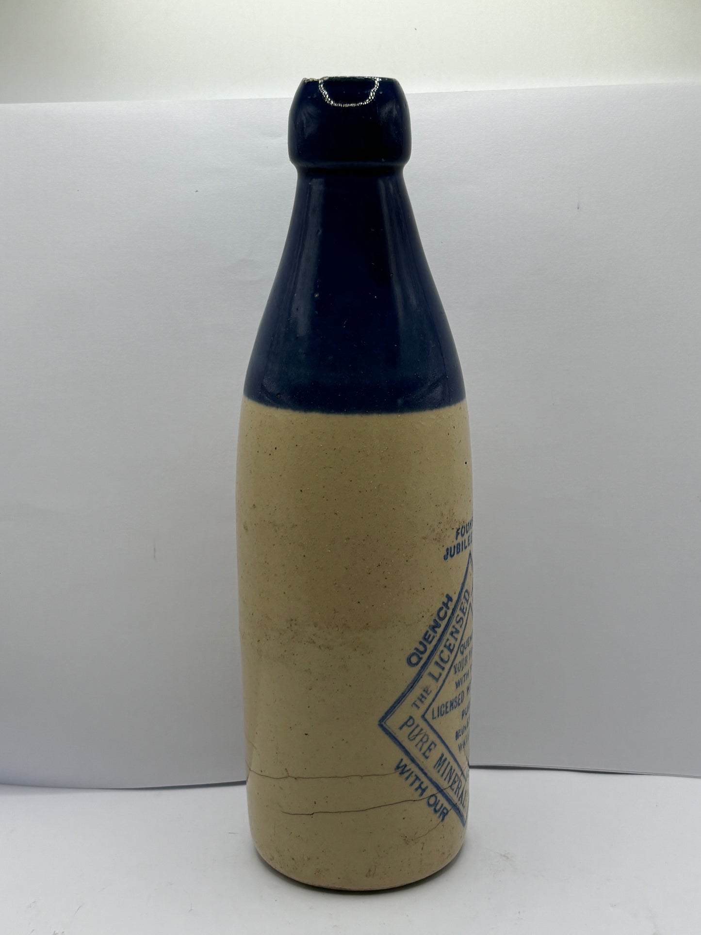 Old blue top ginger beer bottle