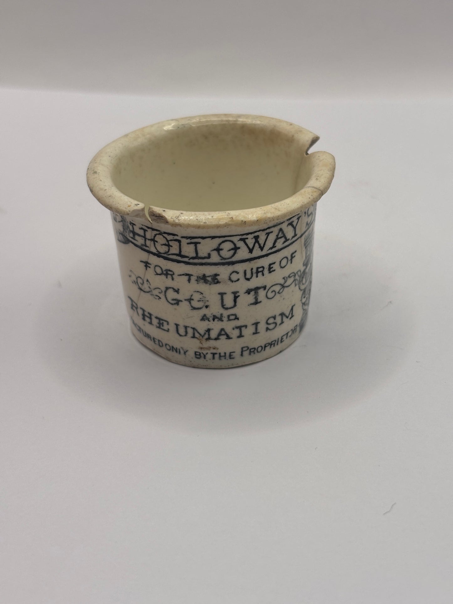 Old advertising ointment pot, Holloway’s ointment. Damaged
