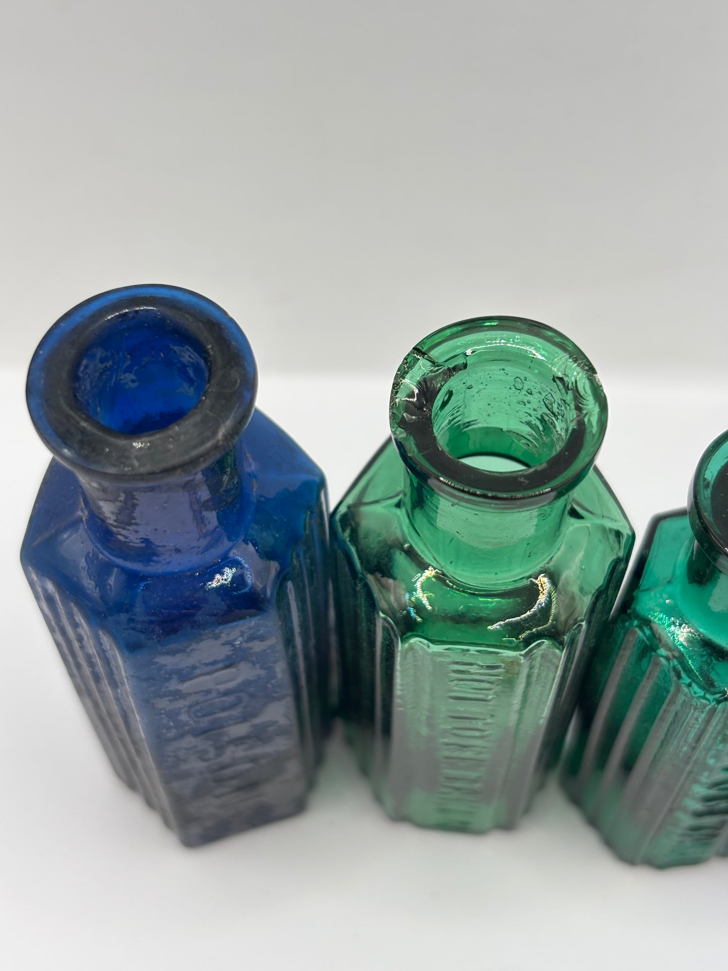 4 old glass poison bottles, chipped (C)