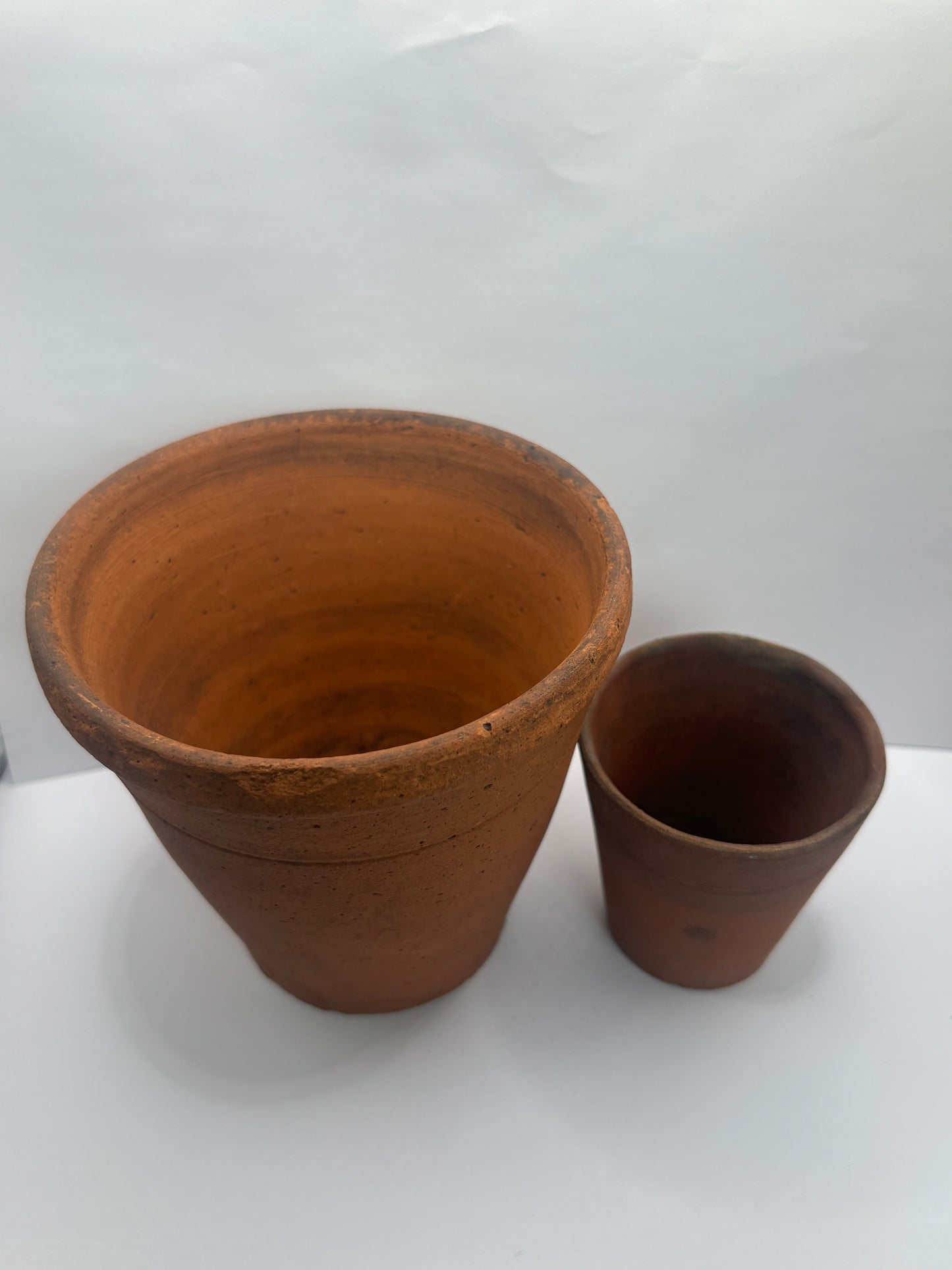 2 old terracotta plant pots