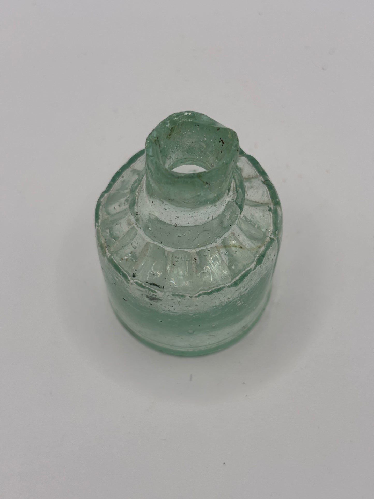 Old aqua glass inkwell, ink bottle. Penny ink