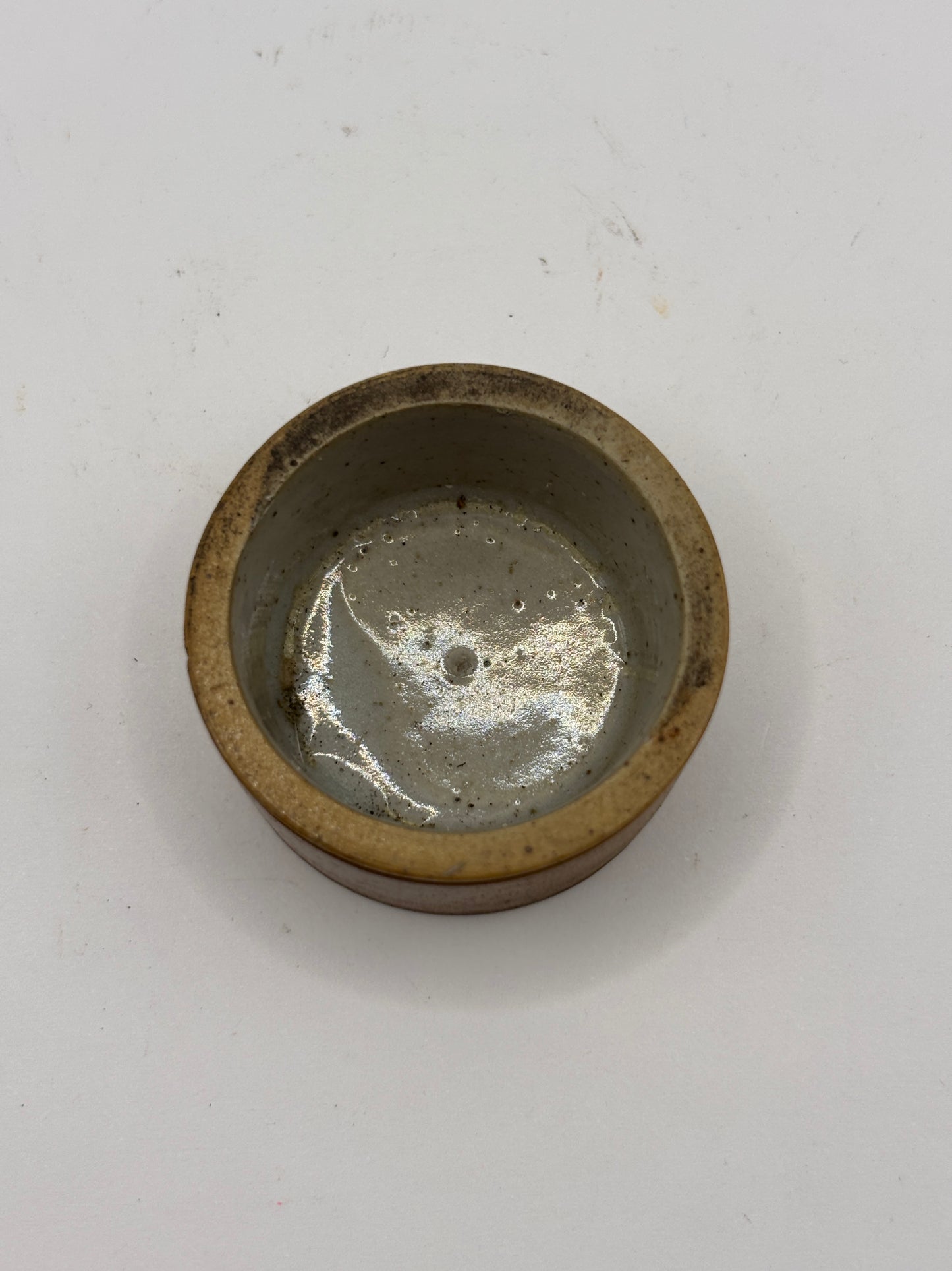 Small brown stoneware ointment dish