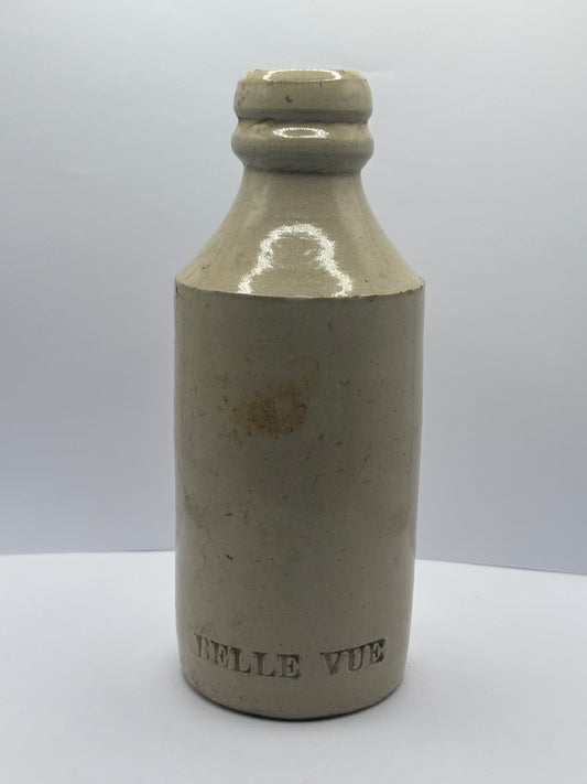 Old white stoneware Belle vue ginger beer bottle