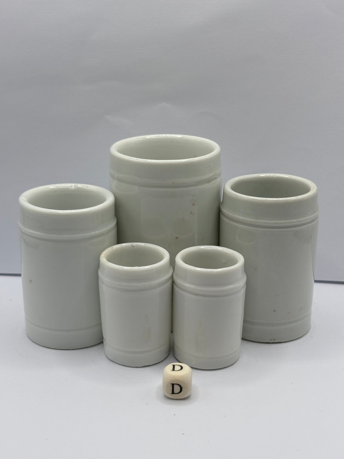 5 small white stoneware pots (D)