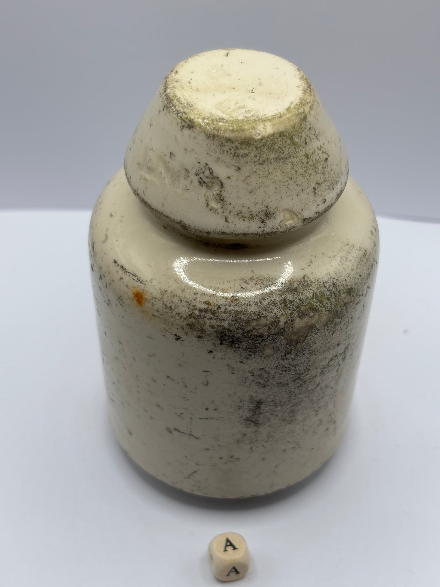 Old stoneware telegraph pole insulator (a)