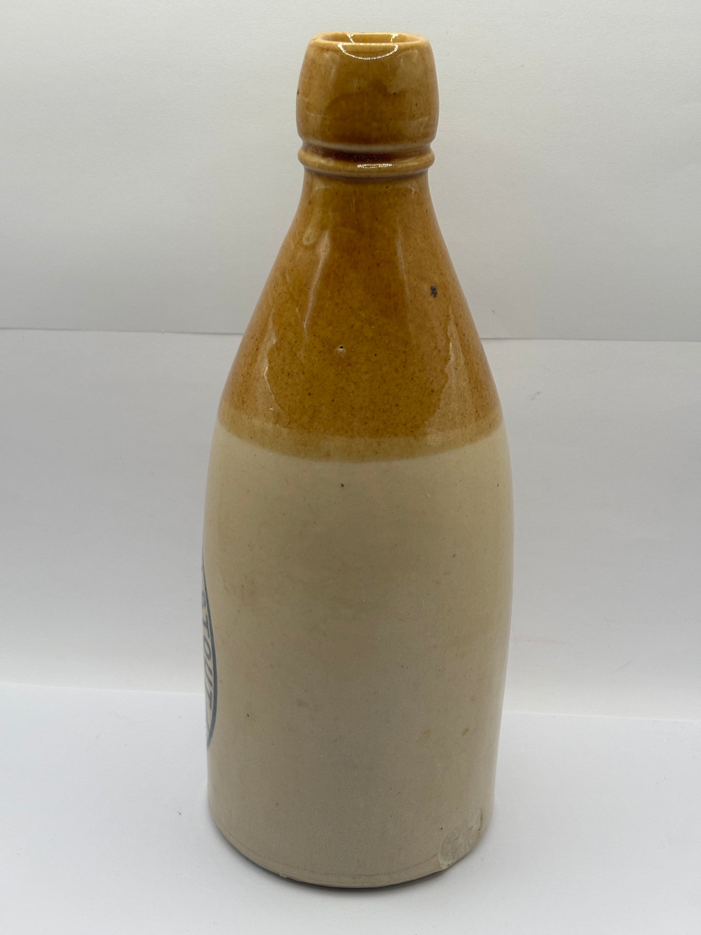 Old stoneware ginger beer bottle, Best London stout, Ventnor Isle of wight