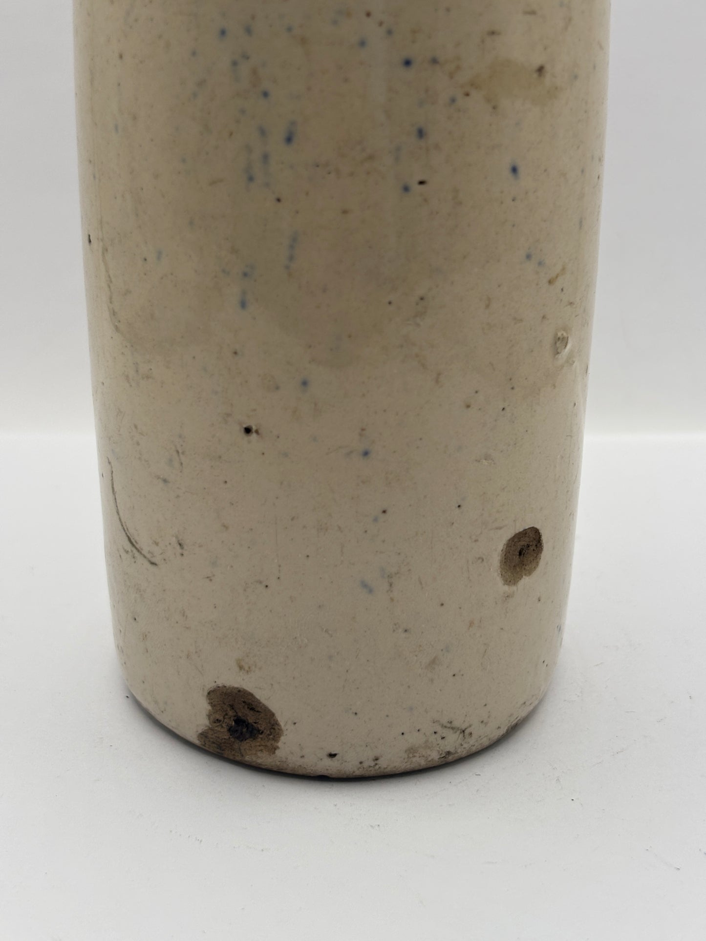 Old blue top stoneware ginger beer bottle, E.E Bevan Neath Brewery