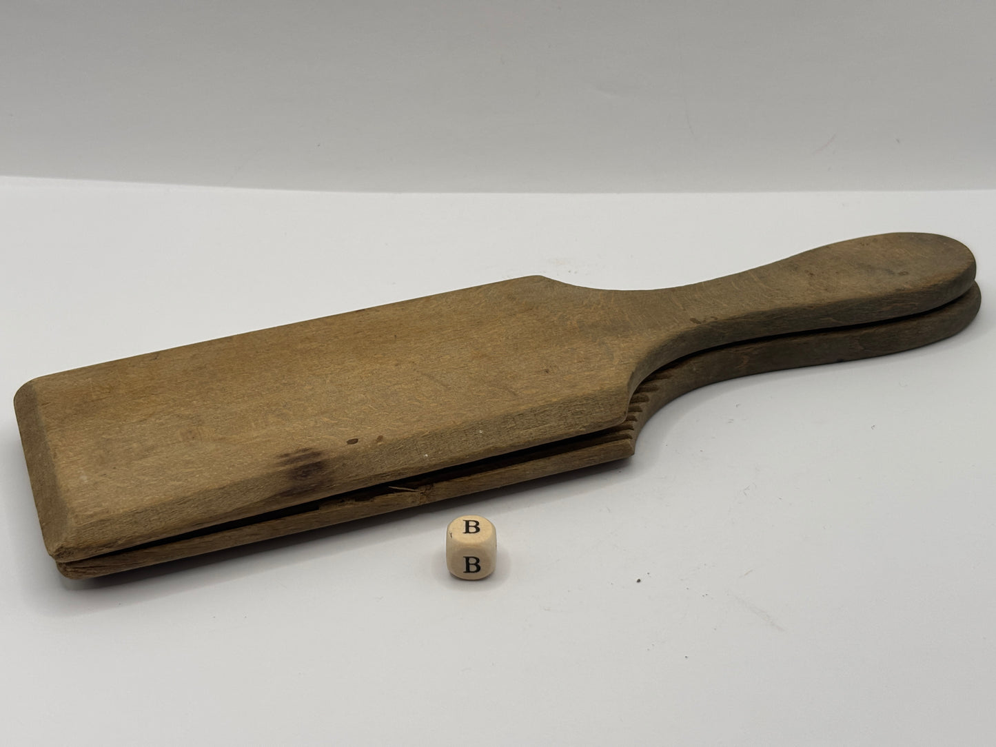 Old wooden butter pats (B)