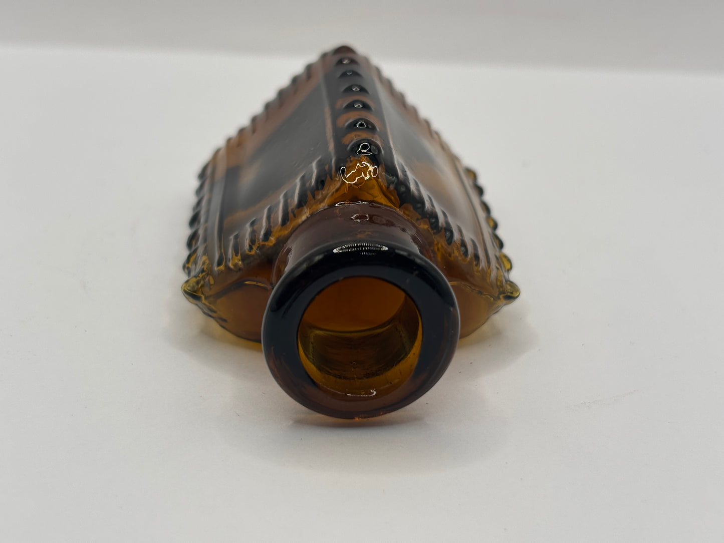 Old amber glass poison bottle