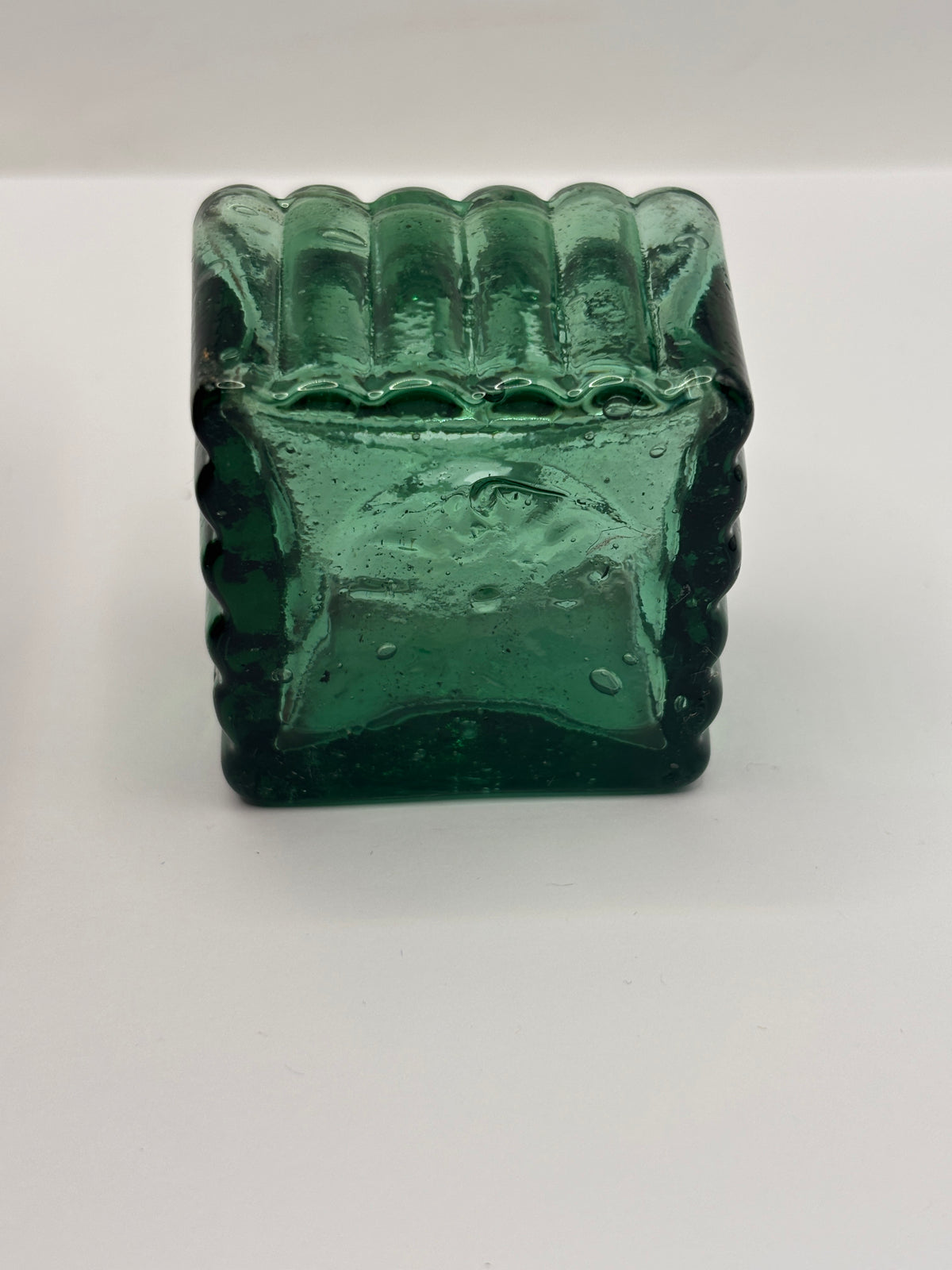 Old dark green glass inkwell, ink bottle, penny ink