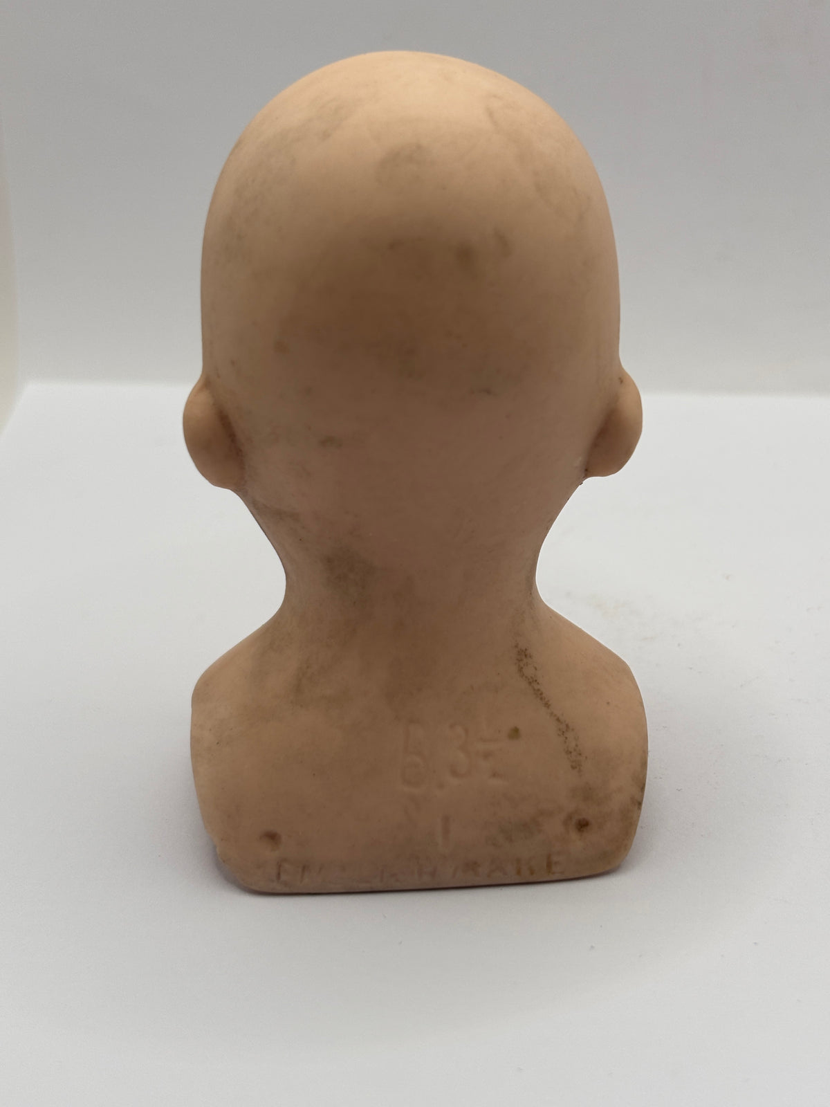 Old dolls head 9cms