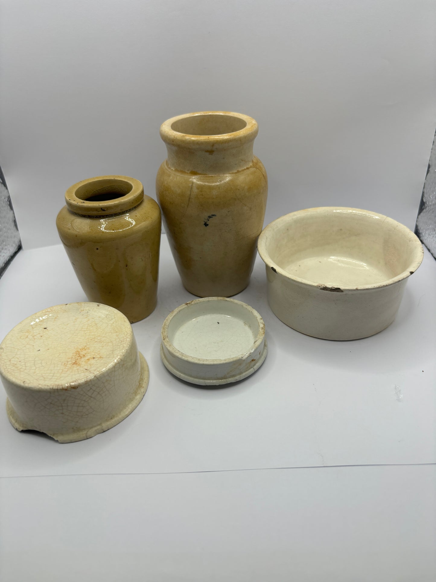 5 damaged advertising pots