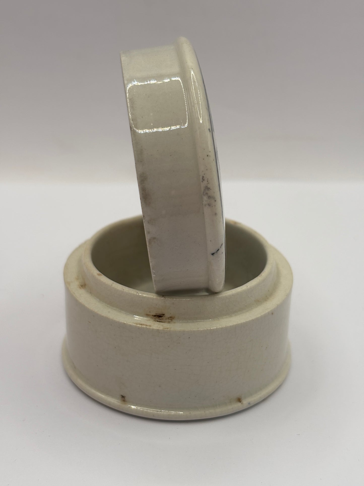 Old advertising lid and base. Woods areca nut tooth paste