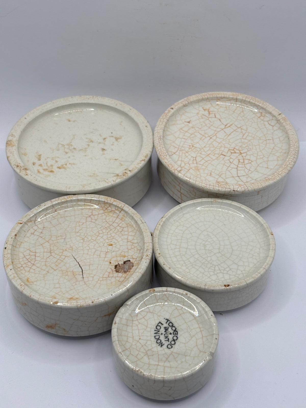5 old stoneware pot lid bases, stackers (B)