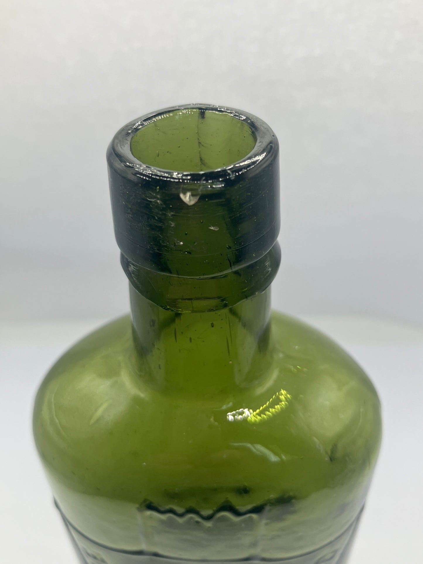 Dark green Bradford chemist bottle