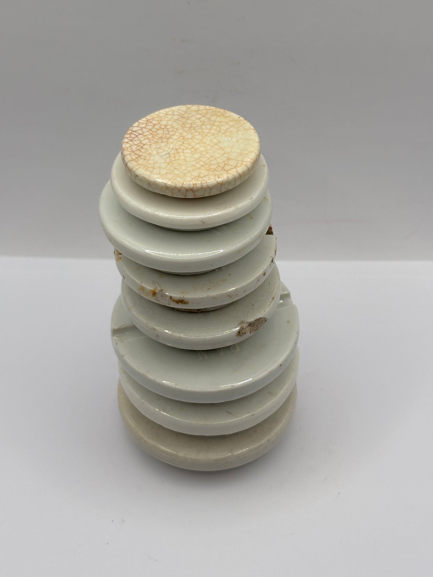 8 stoneware lids, stacking lids. Damaged