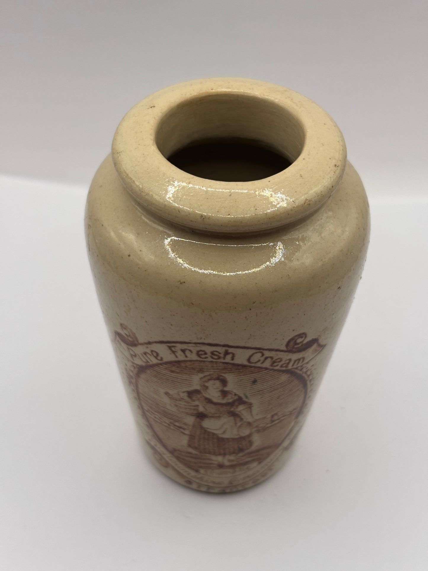 Old stoneware advertising cream pot, pure fresh cream Stranraer. Serpia print. milk maid
