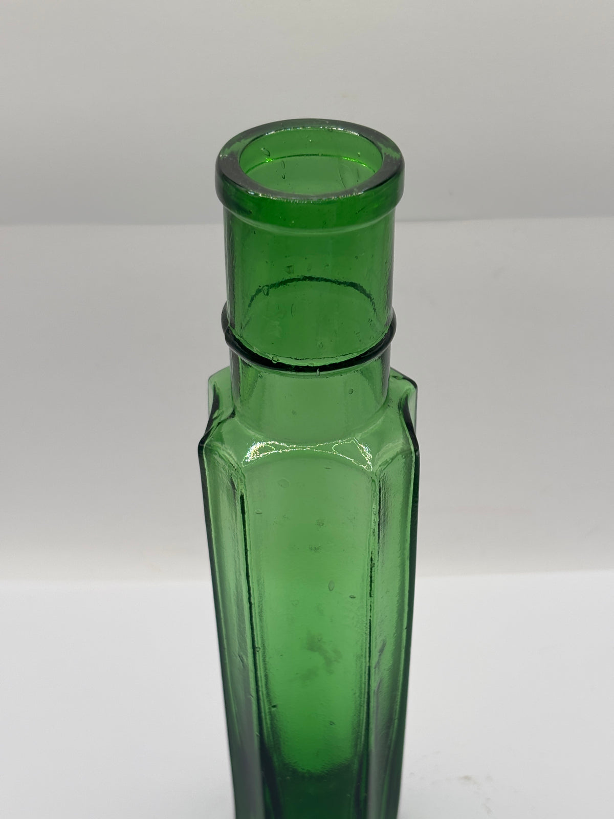 old tall green glass bottle 21cms