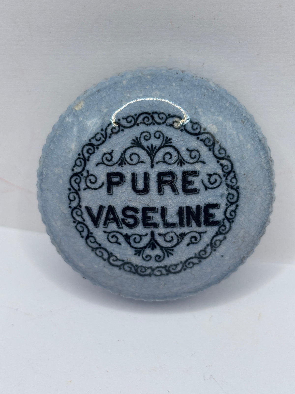 Old advertising button lid, Pure Vaseline