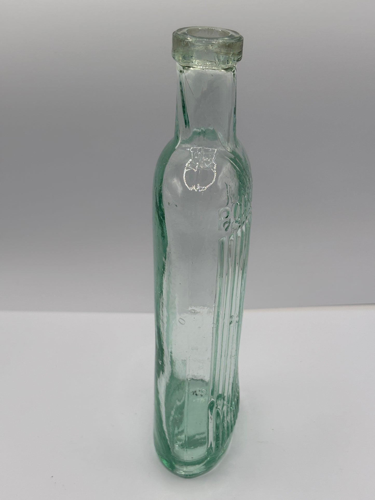 Old aqua glass poison bottle, Poisonous