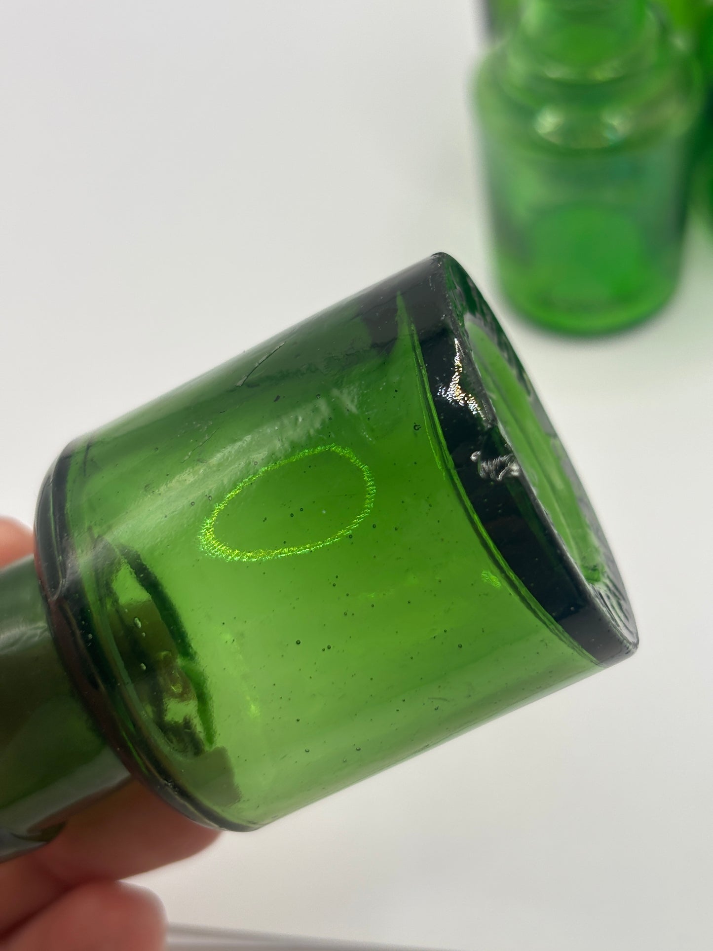 4 old green glass jars
