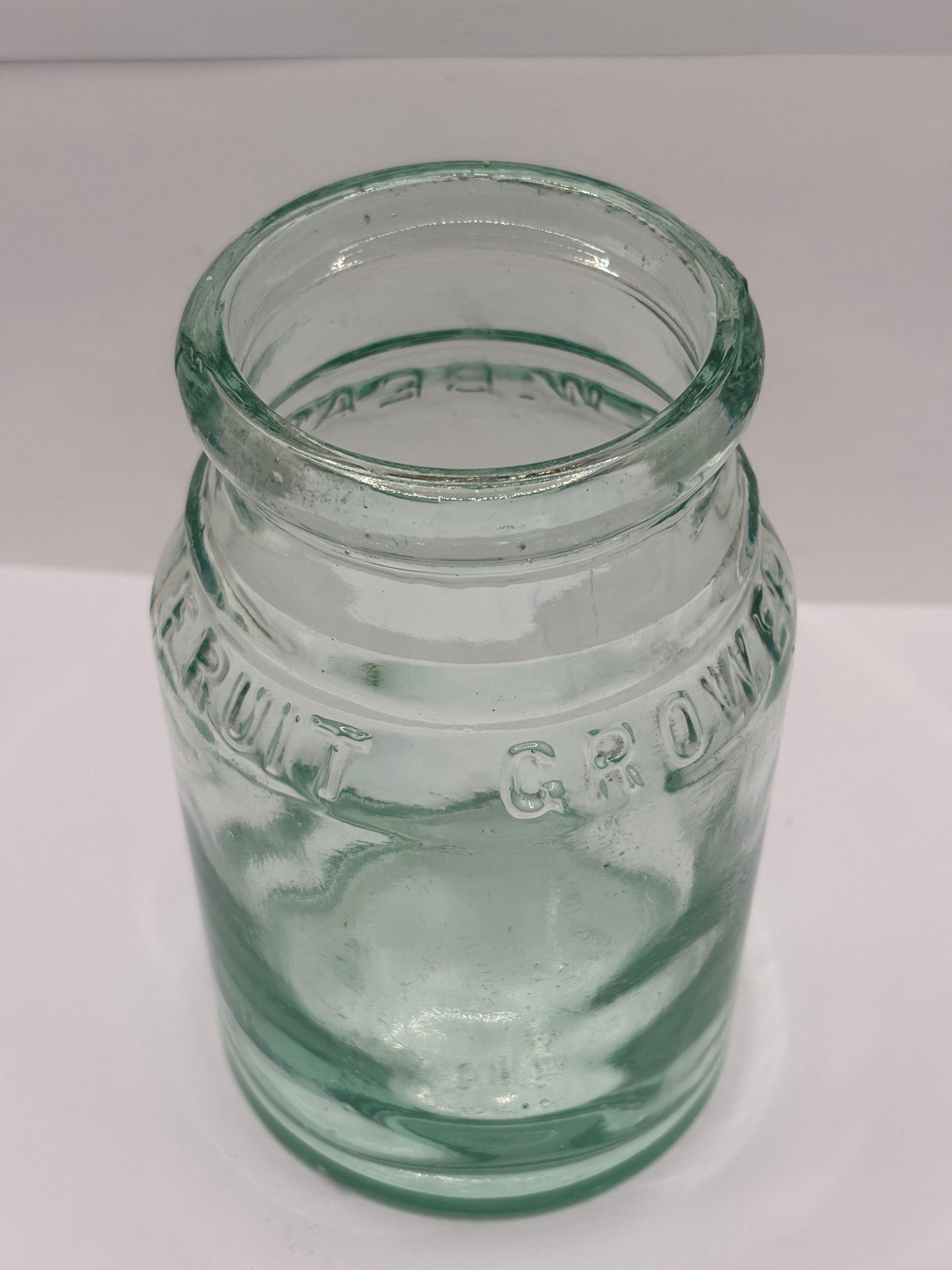 Old aqua glass fruit growers preserve jar