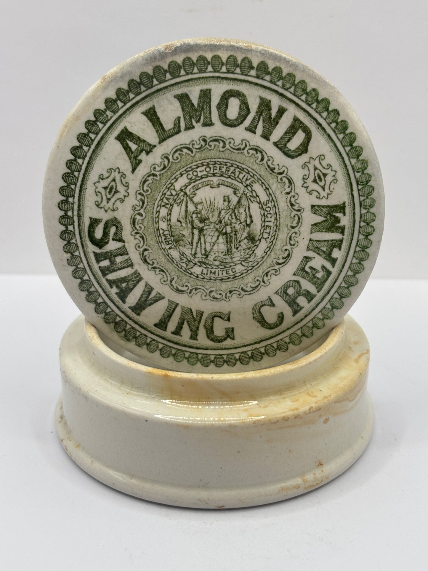 Old green print advertising lid and base, Almond shaving cream