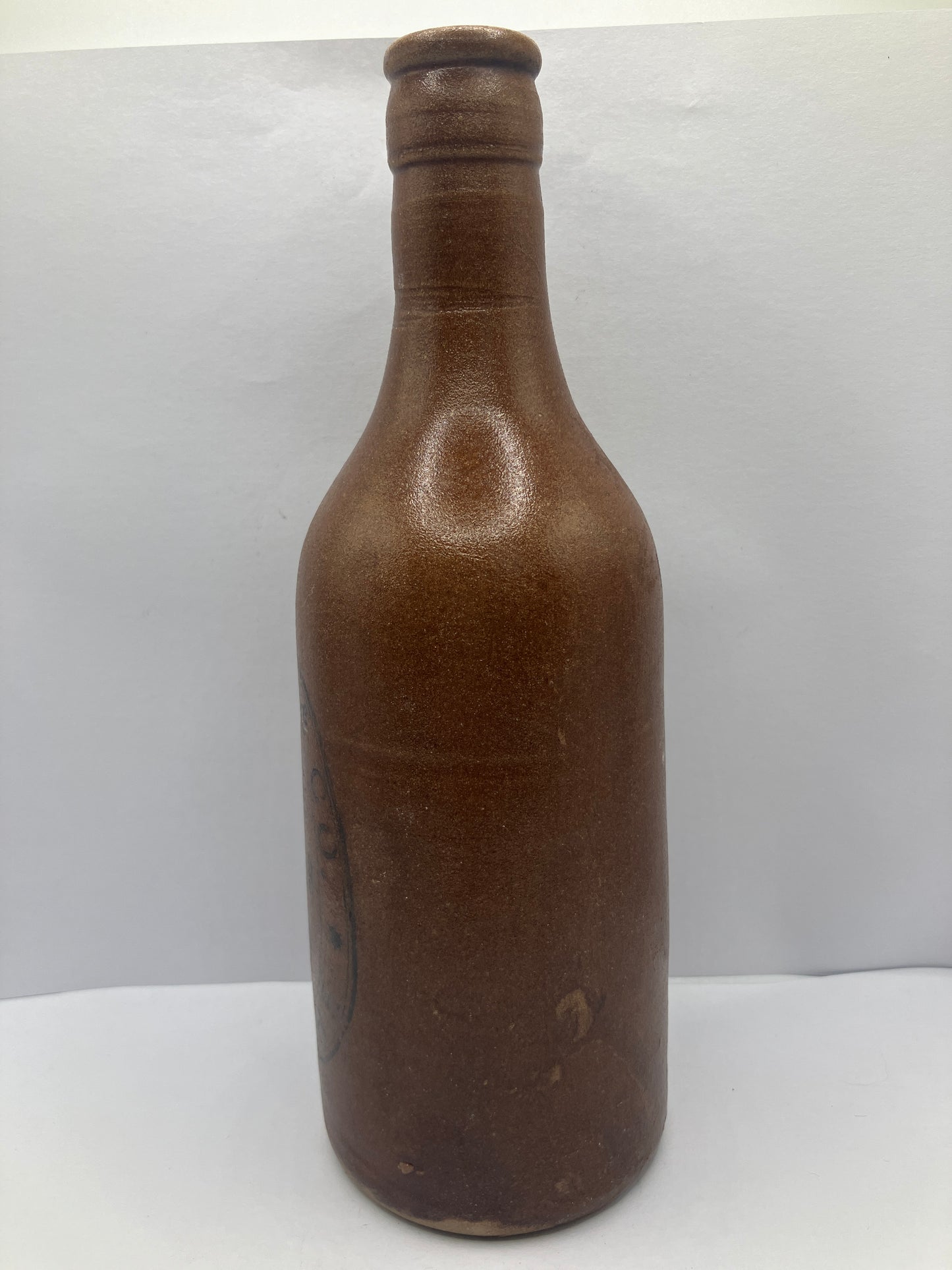 Brown stoneware ginger beer bottle, Harris & Co