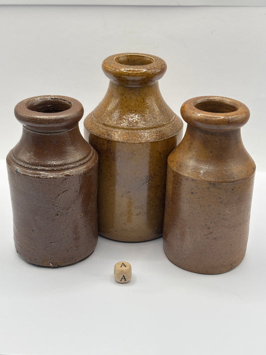 3 tall brown stoneware pots (a)
