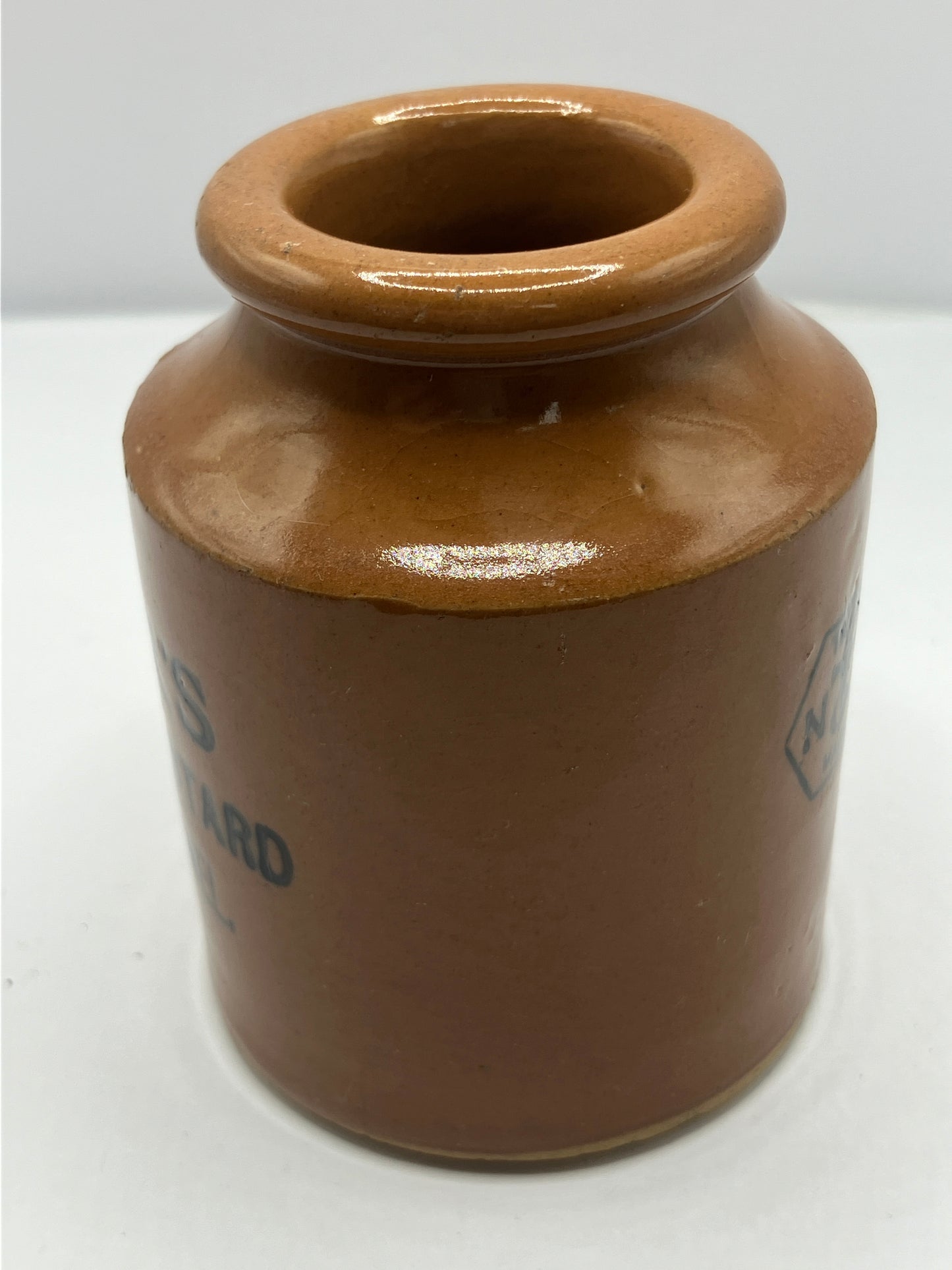 Brown stoneware mustard pot