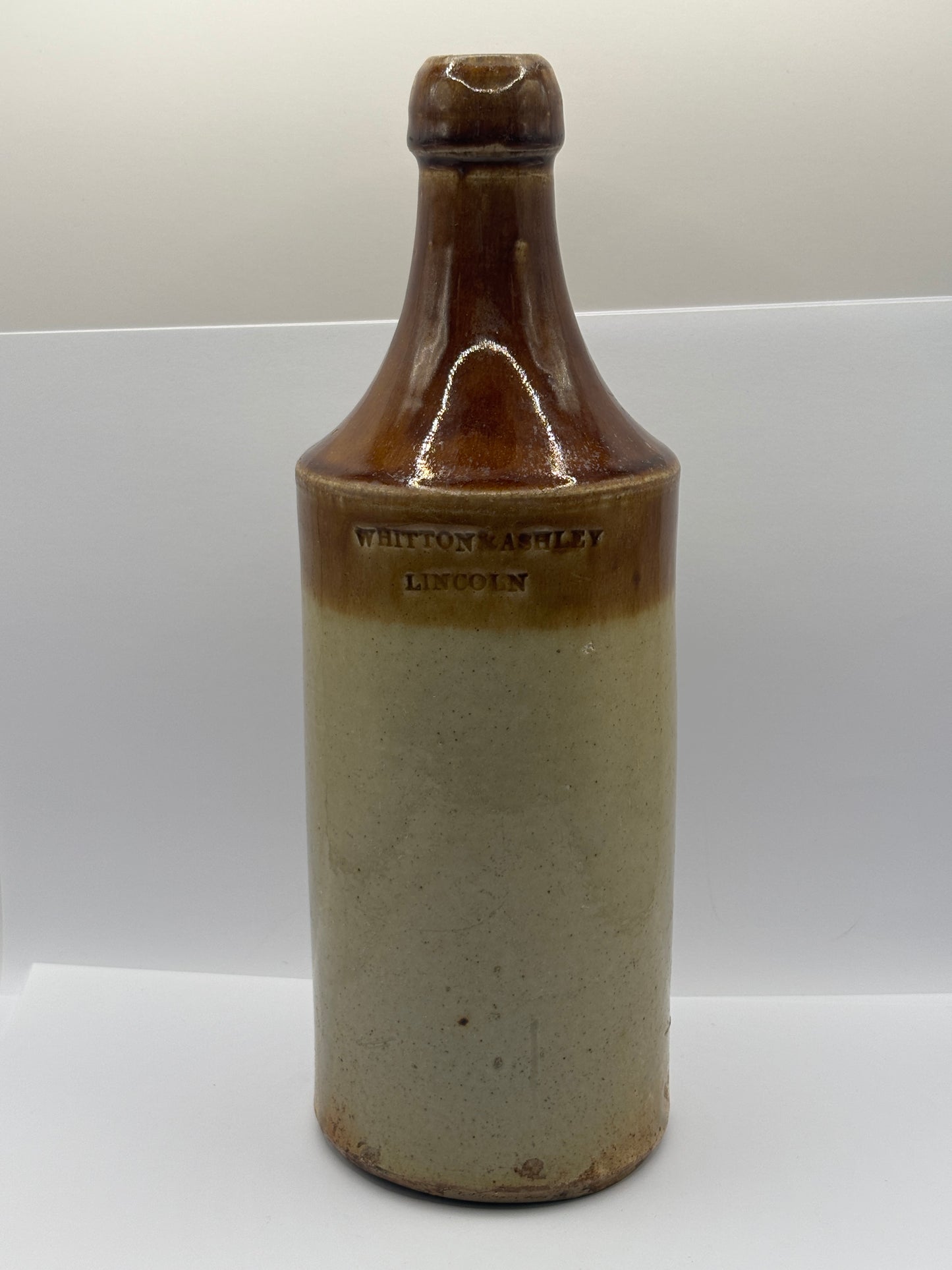 Old Lincoln stoneware bottle. porter. Whitton & ashley