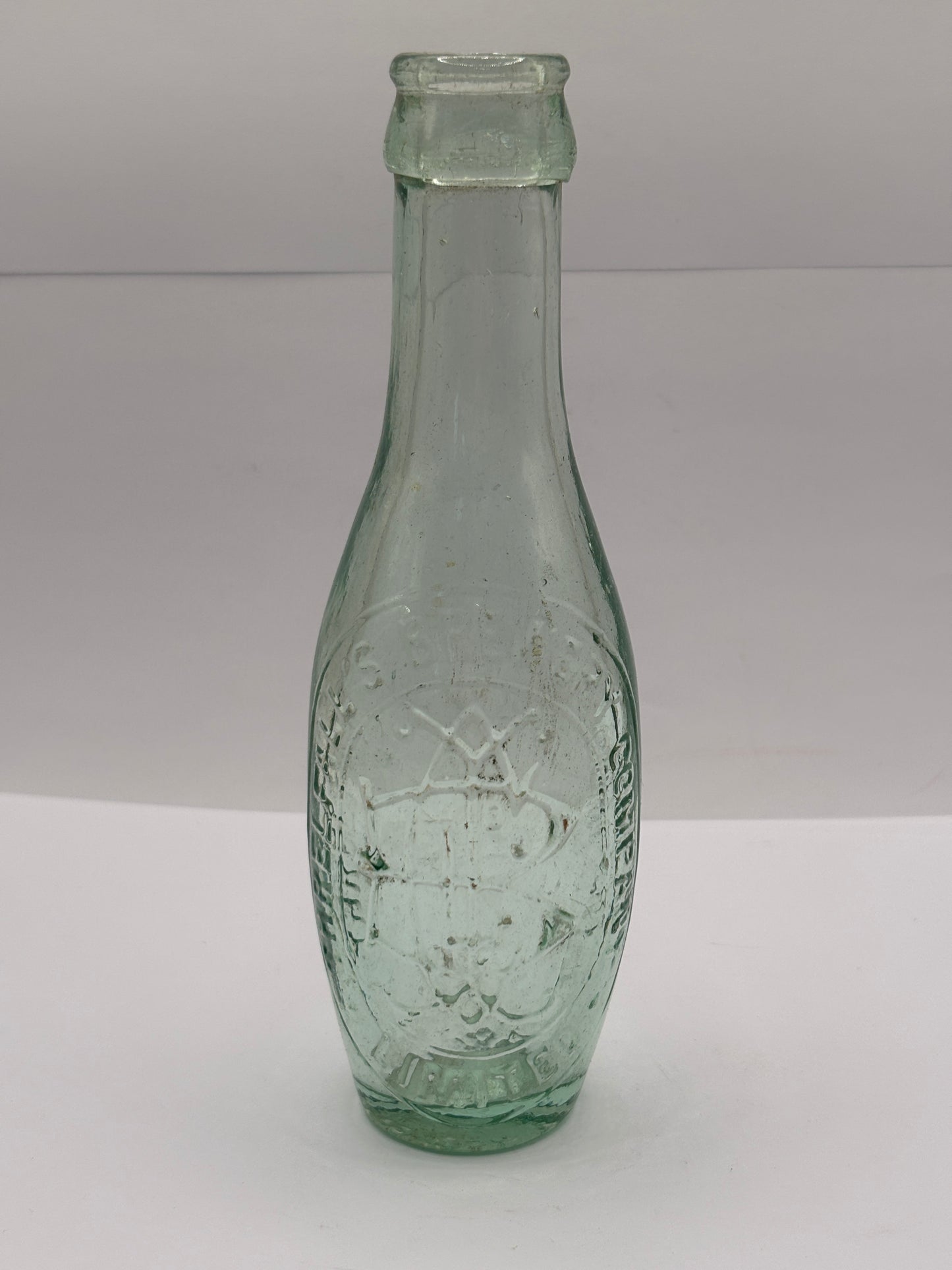 Old flat bottom hamilton bottle, Threlfalls brewery co