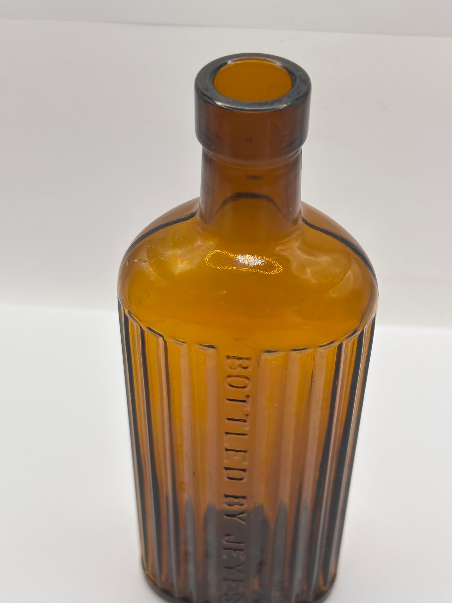 Old amber glass Jeyes fluid bottle