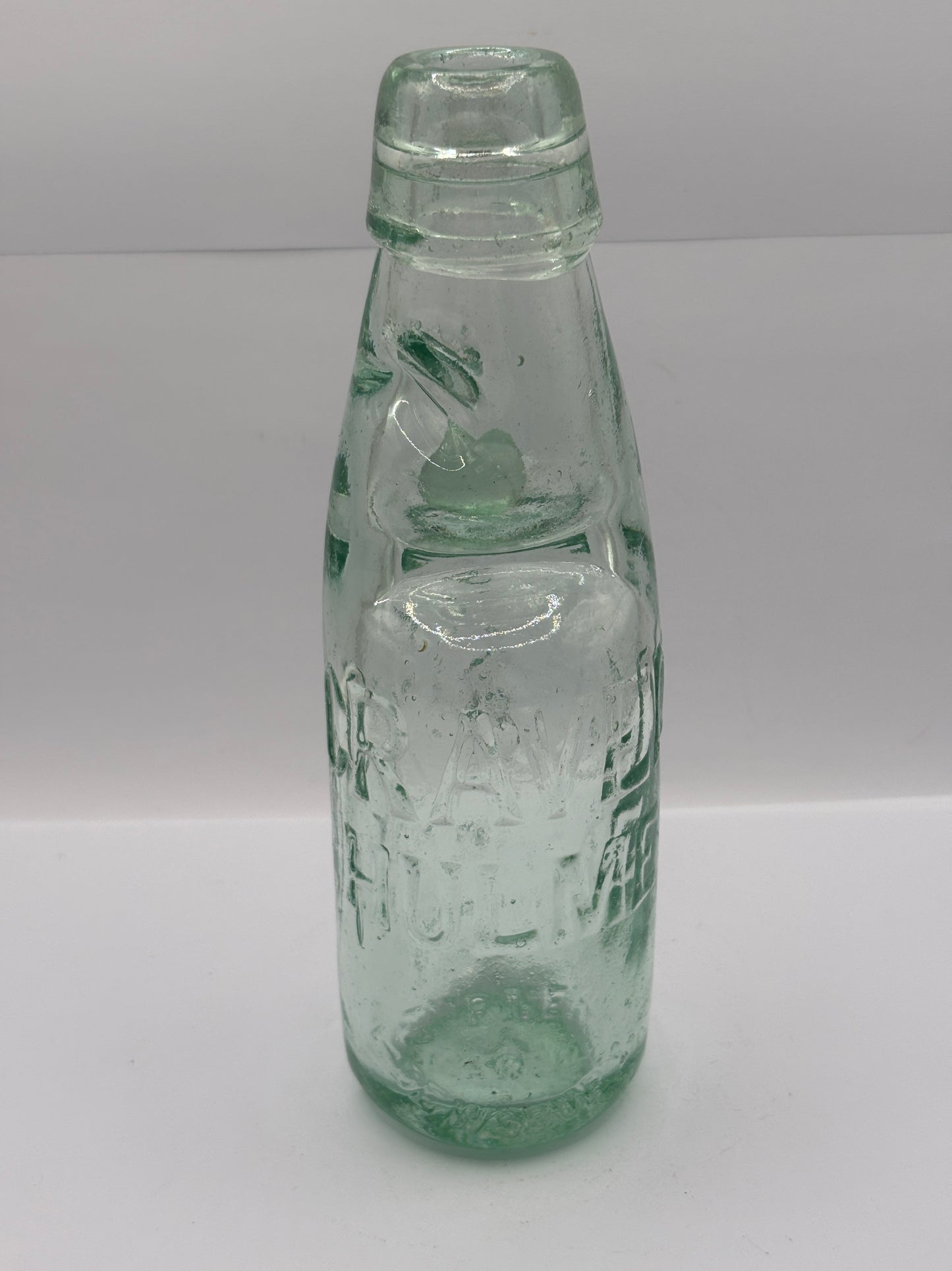 Old Hulme codd bottle, with marble. A.craven Hulme