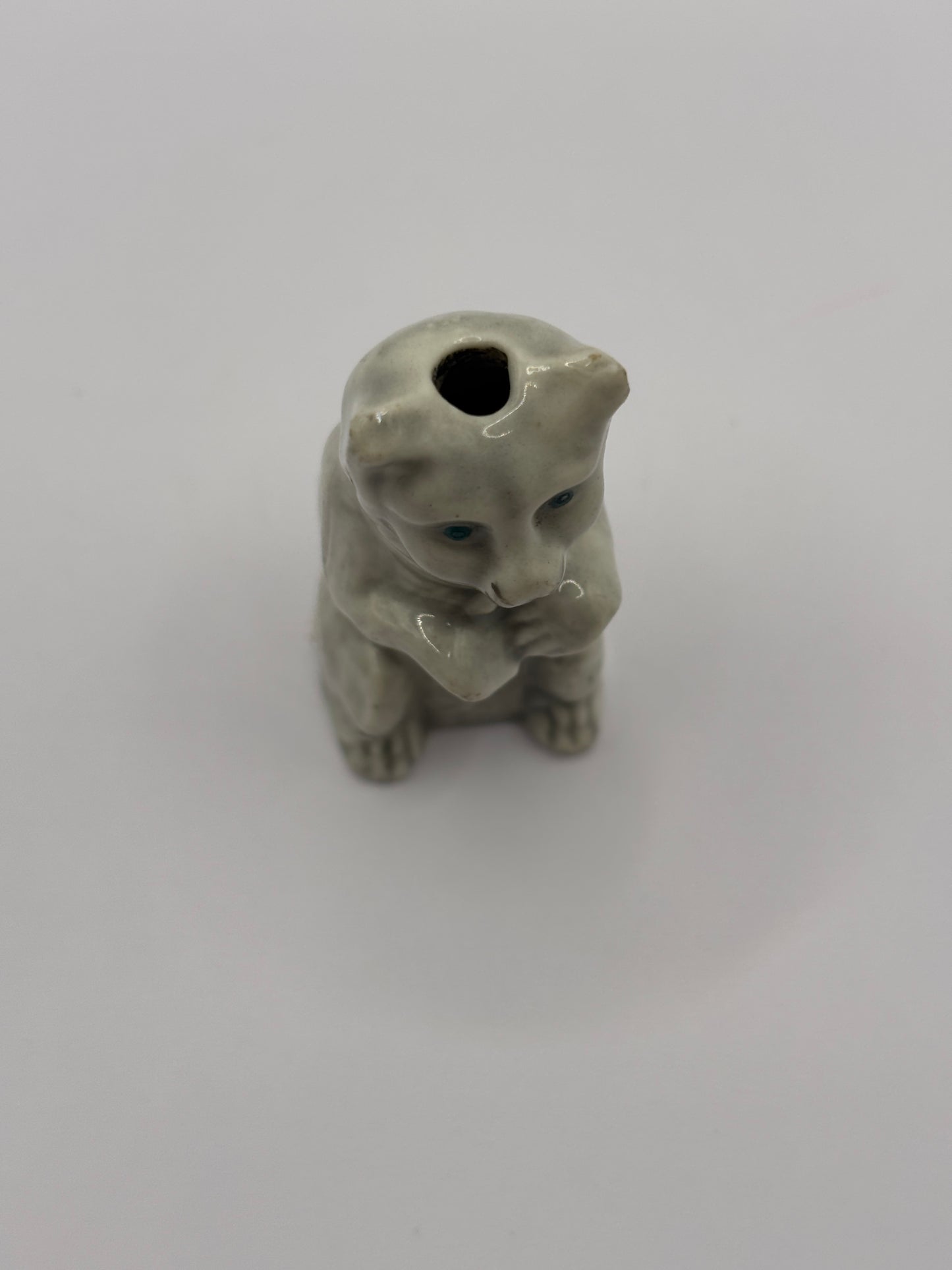 Old stoneware cat decoration