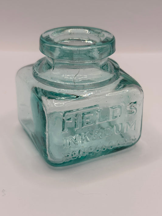 Old aqua glass advertising inkwell, ink bottle. Fields ink
