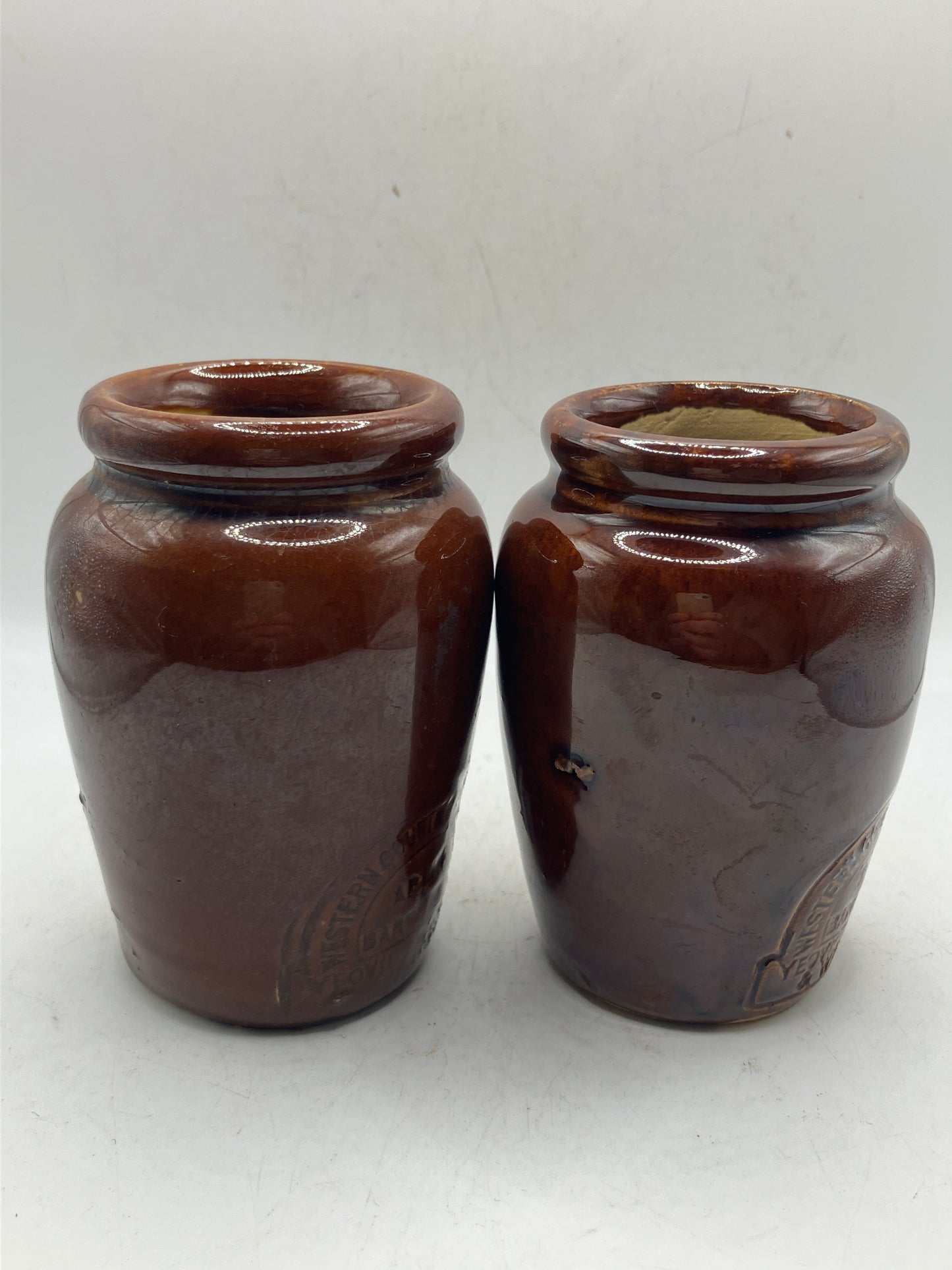 2 brown stoneware cream pots, western countries creameries