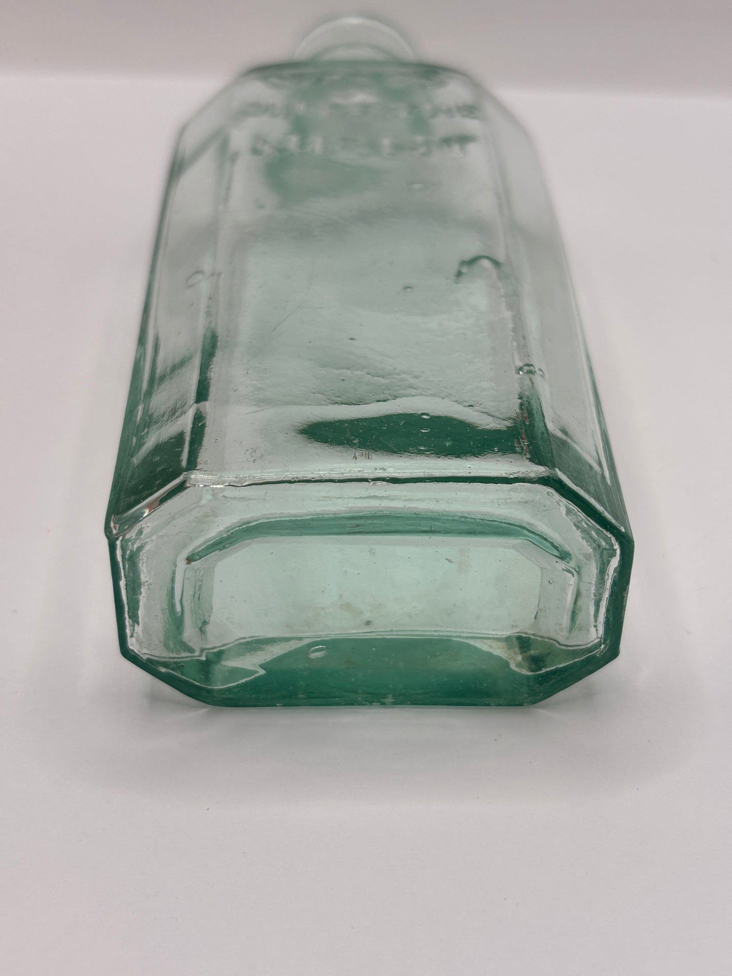 Old glass advertising chemist bottle, Days oil of the night