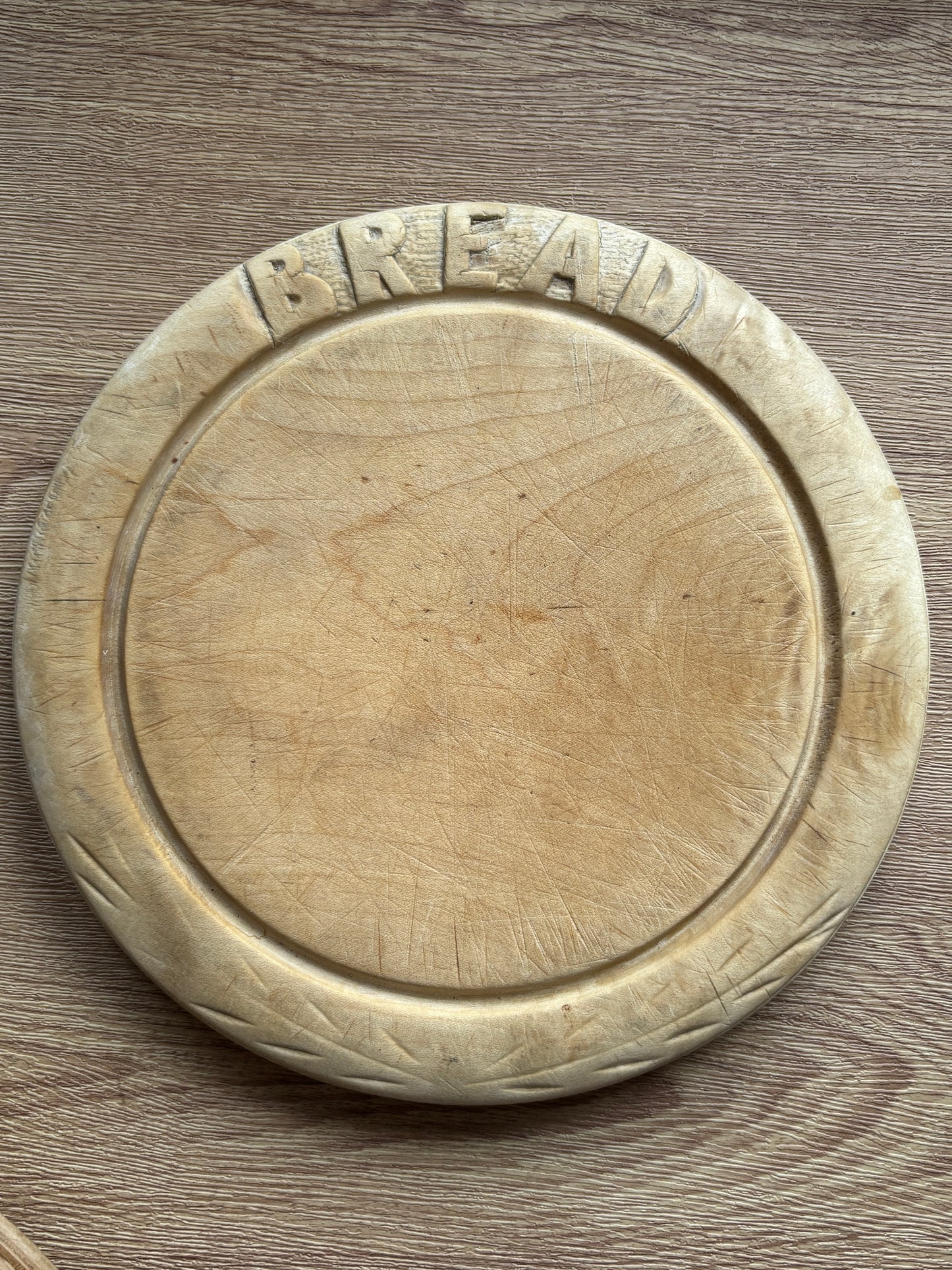 Old carved bread board, Bread