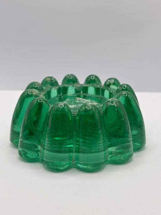 Old green glass paperweight