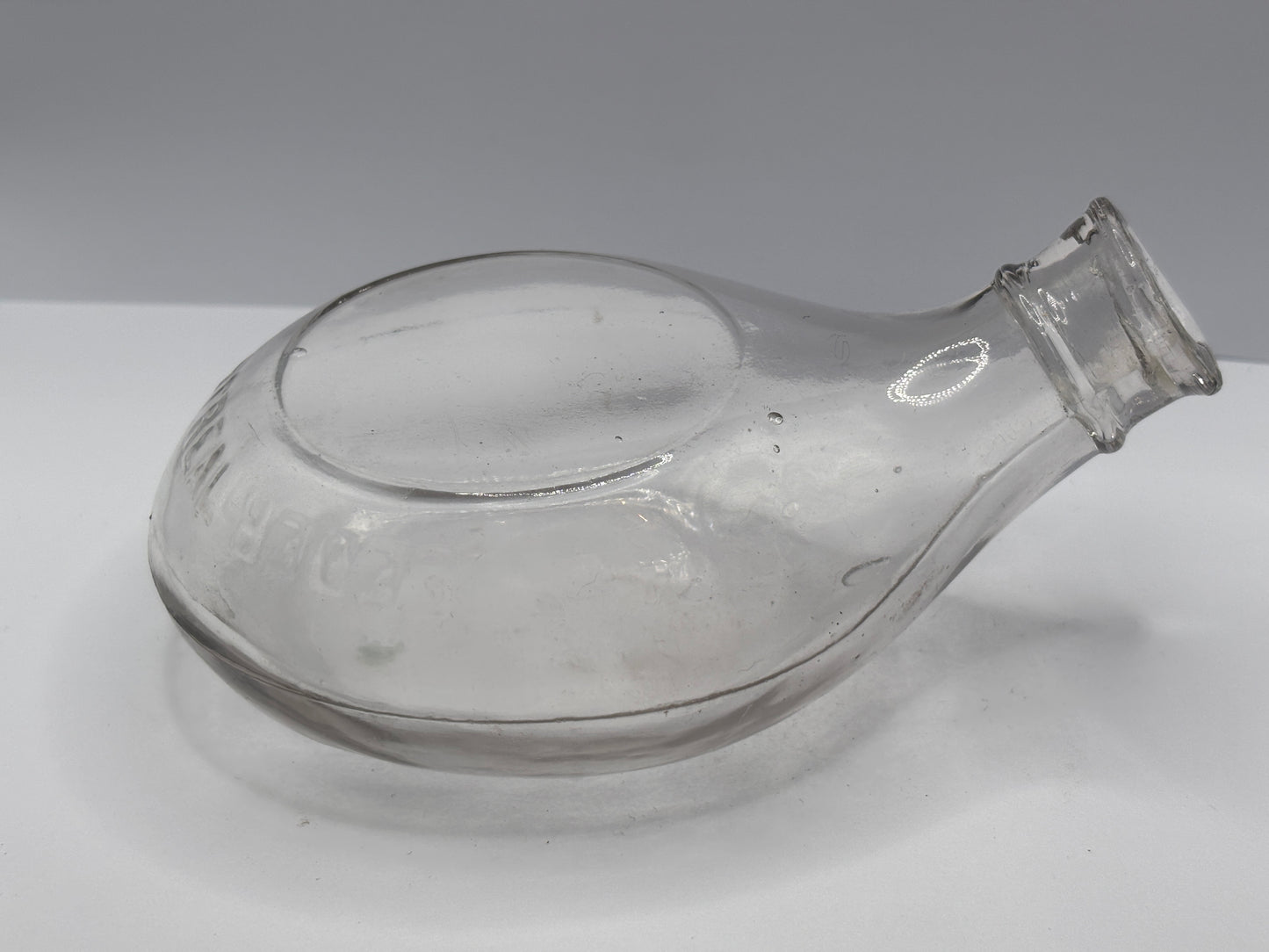 Old clear glass baby feeder. Montreal