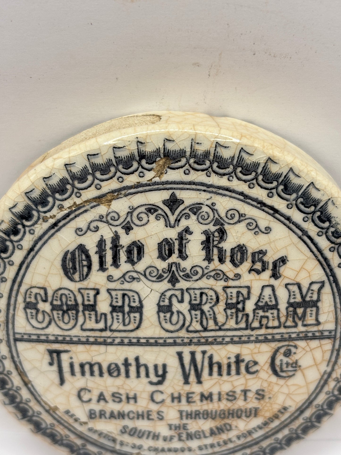 Old advertising lid, Otto of rose Cold cream. Damaged/flakey glaze