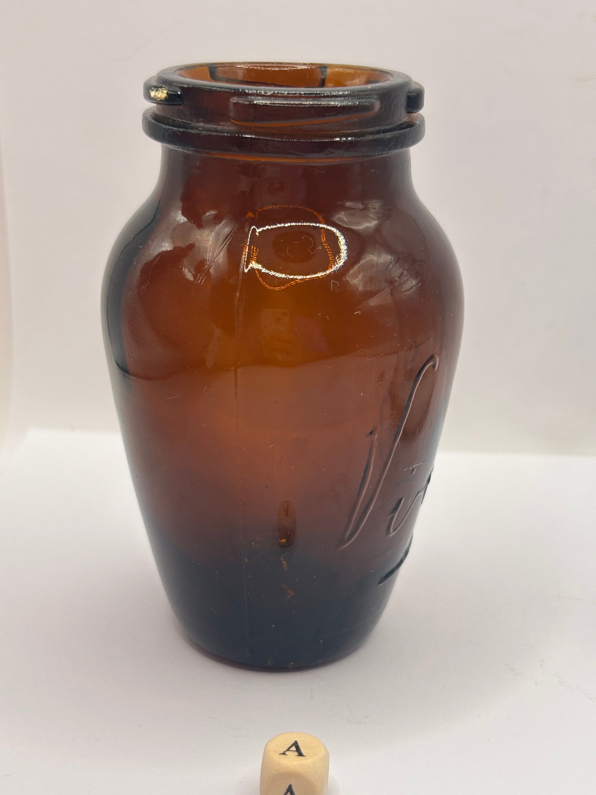Old amber glass Virol jar (a) 10.5cms