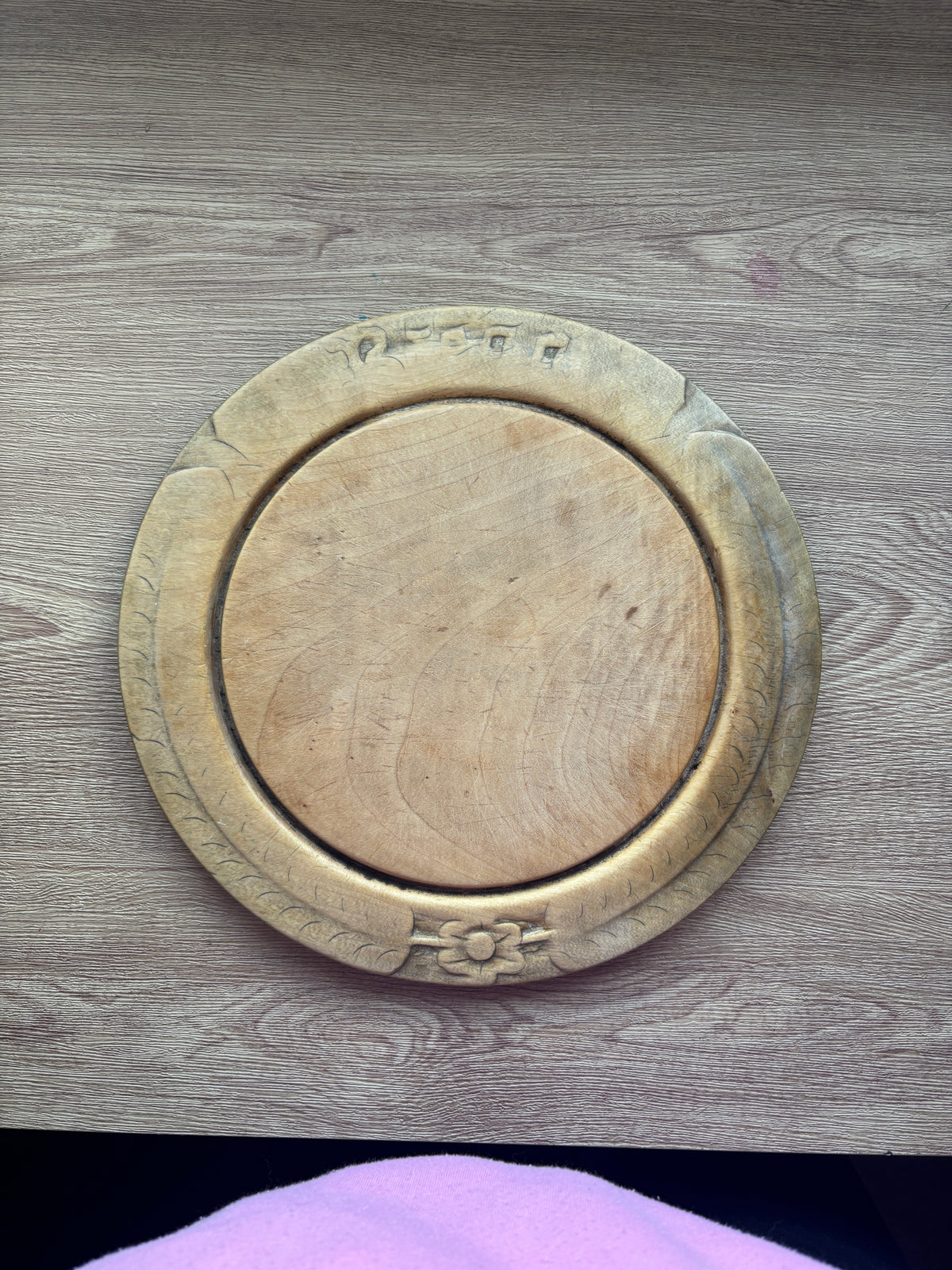 Old wooden carved bread board