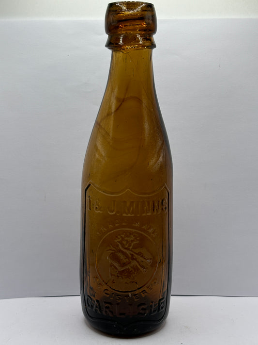 Old amber glass beer bottle, T&J minns Carlisle