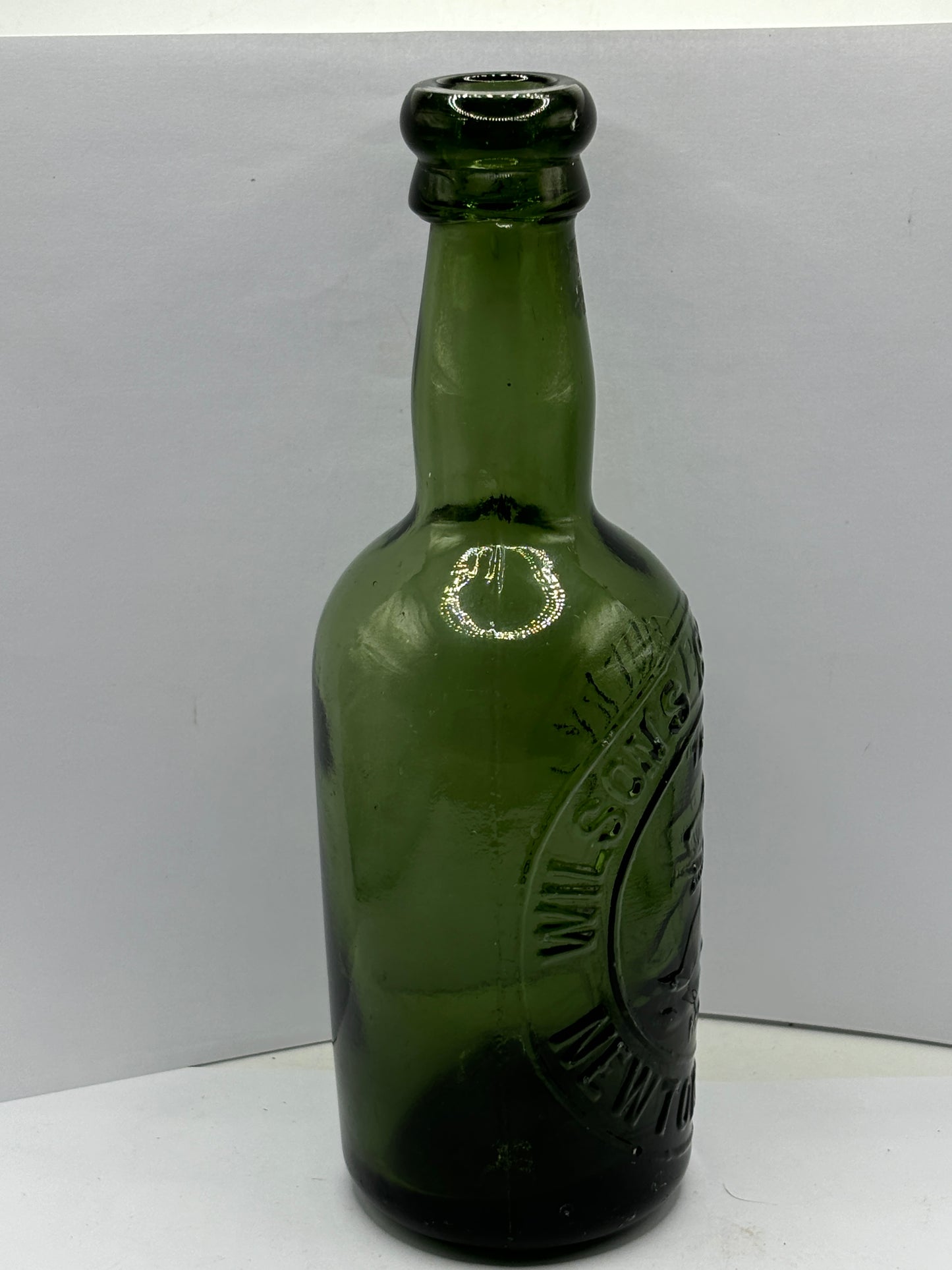 Old glass beer bottle, Wilsons brewery.  Newton Heath