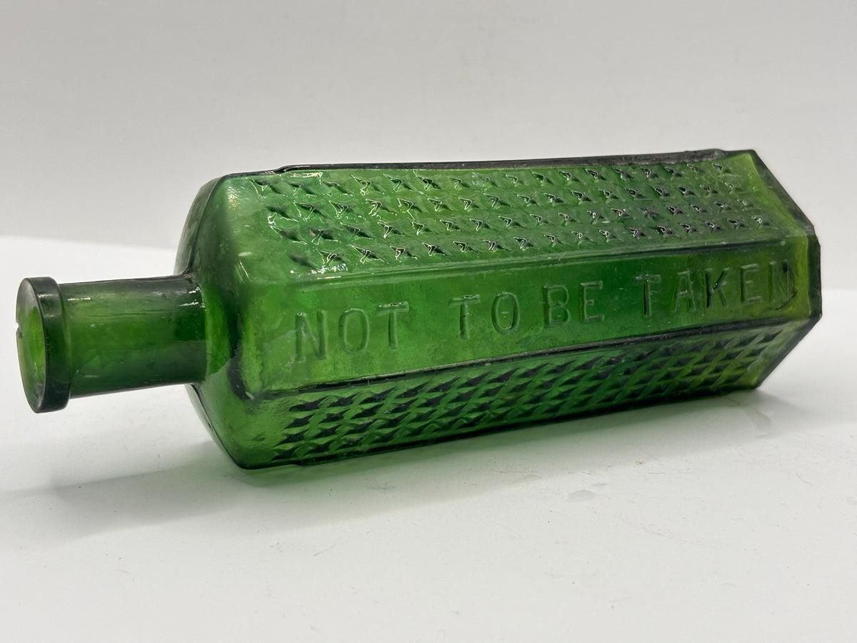 Old crusty green flat back poison bottle, Not to be taken