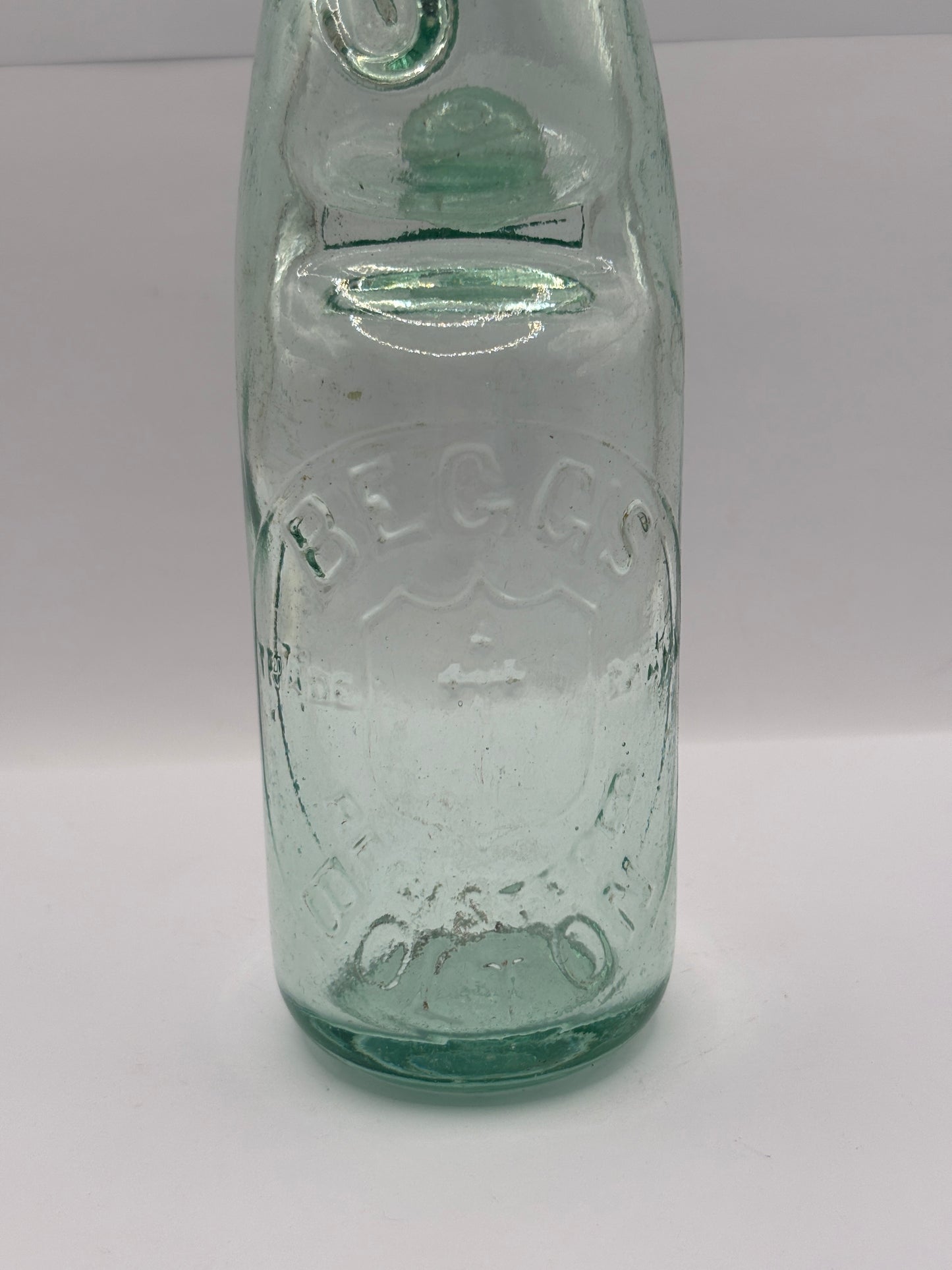 Old Bolton codd bottle, with marble. Begg’s